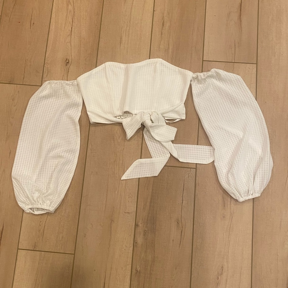 Revolve by the way. White crop top